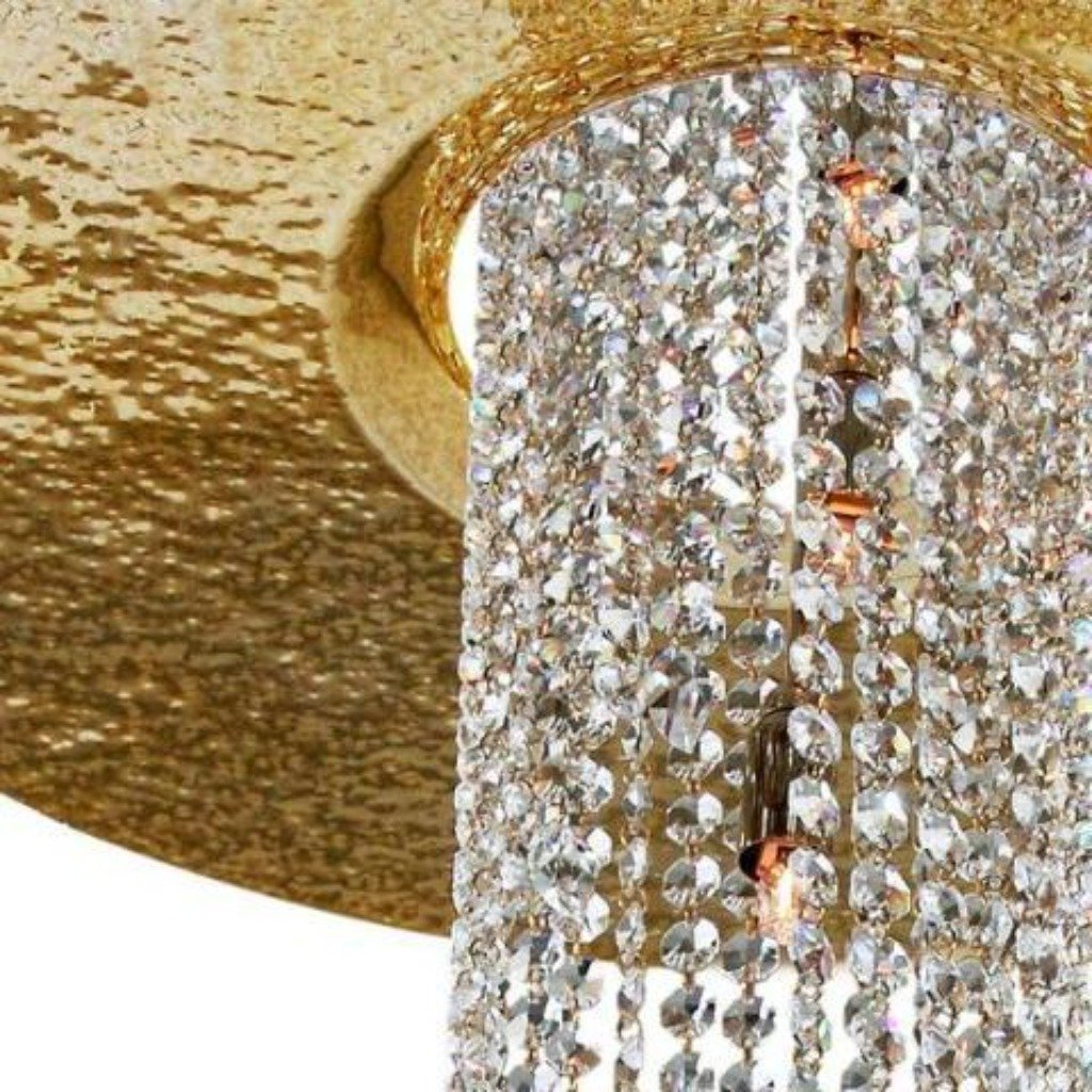 luxurious sophisticated dynamic ceiling lamp chandelier gold Swarovski crystals delicately hammered gold plated brass